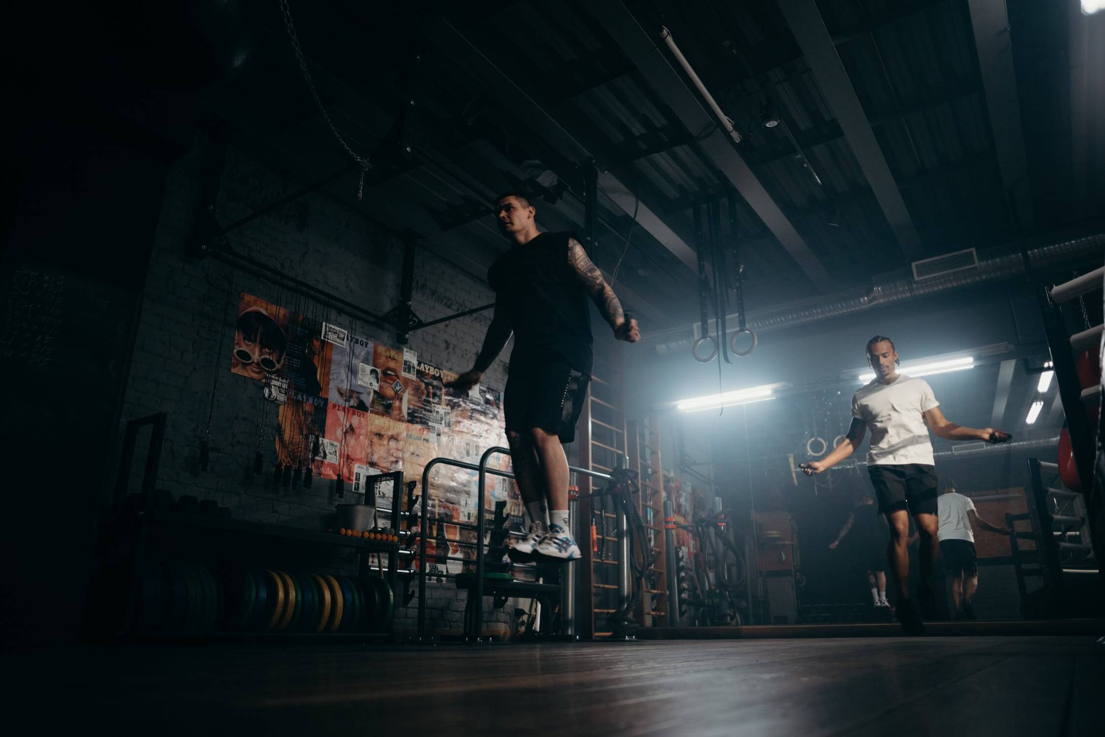 banner image of two men skipping in a boxing gym